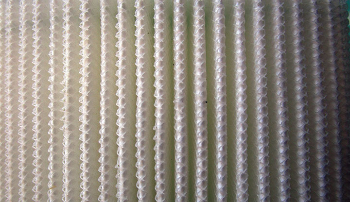 MULTILAYER SYNTHETIC MEDIA WITH NYLON MESH