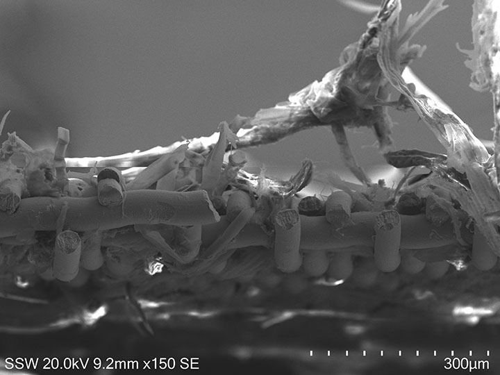 Figure 2: Electron microphotograph of stress fatigue on wire mesh filter.