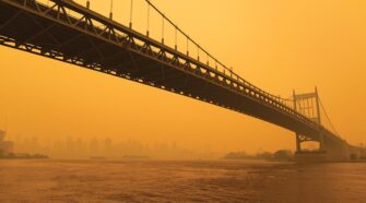 The Triborough Bridge along the East River in New York City with massive air pollution in the sky from wildfires. Photo iStock/James Andrews