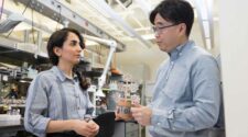 Binghamton University Ph.D. student Maryam Rezaie, left, and Professor Seokheun “Sean” Choi have developed artificial plants that can feed off carbon dioxide, give off oxygen and generate power. Photo courtesy Jonathan Cohen
