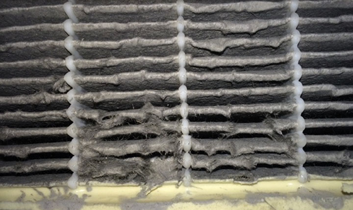 Figure 9: Pleat deformation and rupture of a depth filter installed in a typical air handling unit.