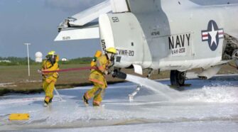 Figure 1: NAS Key West firefighters applying AFFF foam around an old Skywarrior military plane during a training class (1).