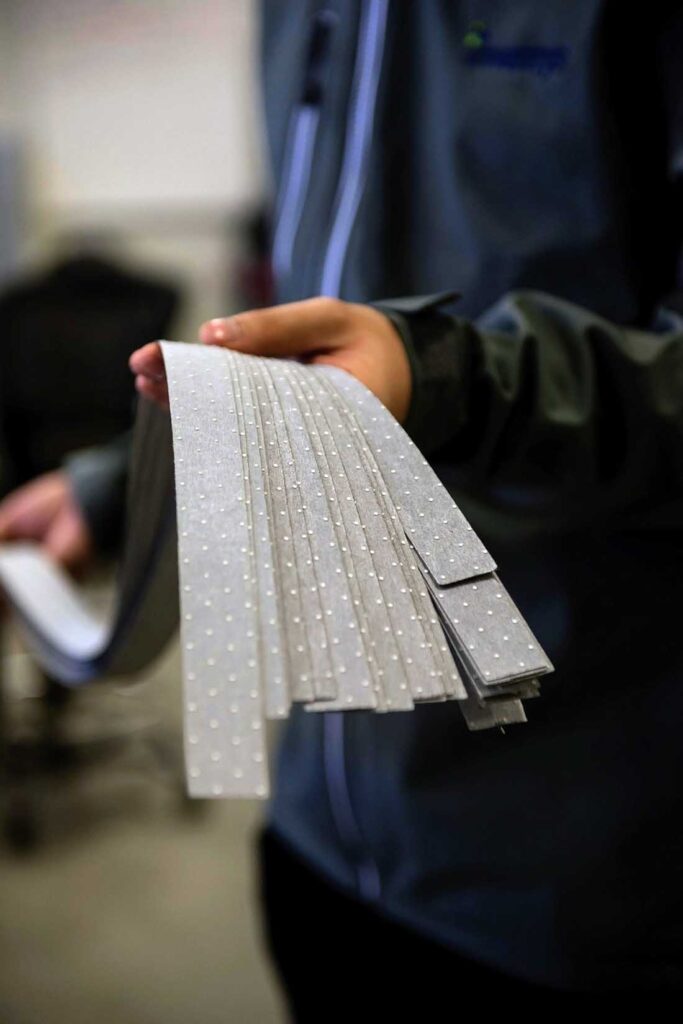 A sugar-cube-sized quantity of MOFs has the surface area of a football field. Photo courtesy of Svante