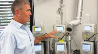 Dr. Bischof in the application laboratory of TSI GmbH in Aachen, Germany, explaining the latest generation of instruments to accurately measure nanoparticles. Photo courtesy of Iyad Al-Attar