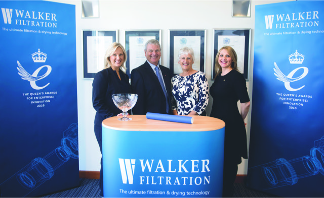 Walker Filtration family receiving the 2016 Queen's Award.